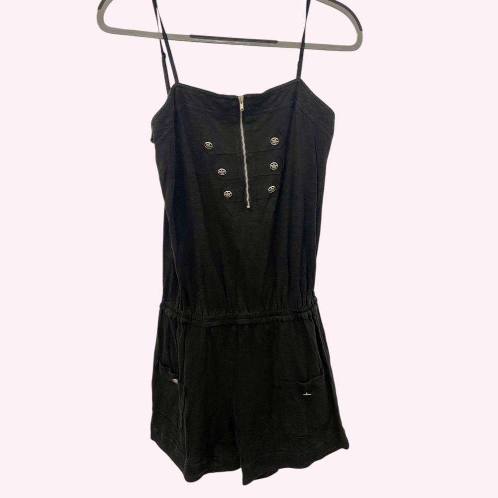 Cute black romper with silver buttons